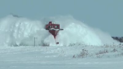 Снегоуборочные поезда в действии.