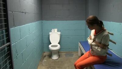Straitjacket bondage in prison