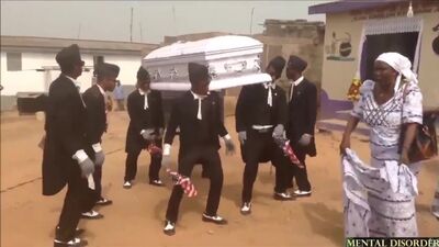 Негры танцуют с гробом